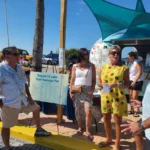 Alan Shanosky, CIndee Shanosky, Council Member Karen Woodson, and Dennis Wagaman discuss the Pier Rebuild at a recent FMB Chamber Friday Power Hour Event in Times Square.
