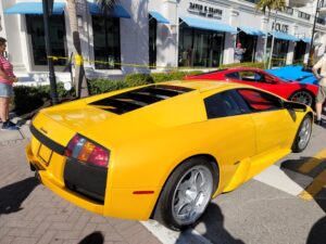 Cars on 5th Naples was a supercar paradise with Ferraris, Lambos, and more—raising millions for St. Matthew’s House.