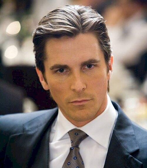 Christian Bale as Bruce Wayne