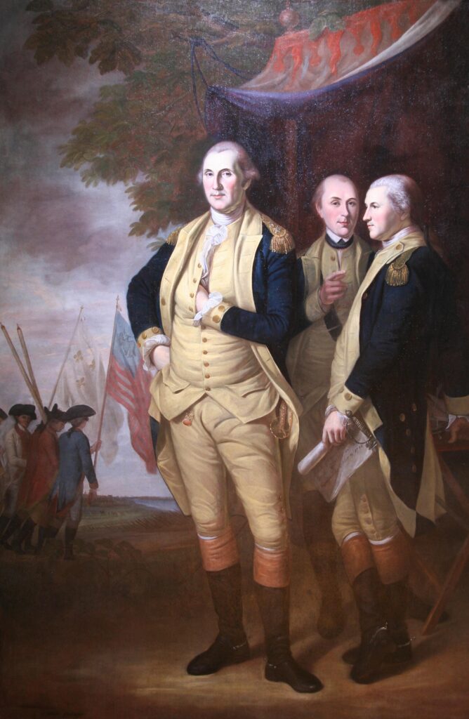 Charles Willson Peale’s postwar portrait places George Washington beside the Marquis de Lafayette and Tench Tilghman, reflecting the leadership, sacrifice, and international alliance that carried revolutionary principles to military victory.